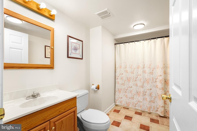 bathroom with toilet, curtained shower, visible vents, and vanity