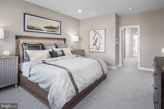 carpeted bedroom featuring radiator, recessed lighting, and baseboards