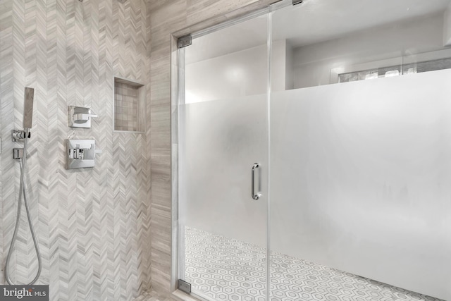 bathroom featuring a shower stall