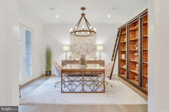 dining space featuring ornamental molding, recessed lighting, and an inviting chandelier