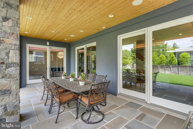 exterior space with wooden ceiling