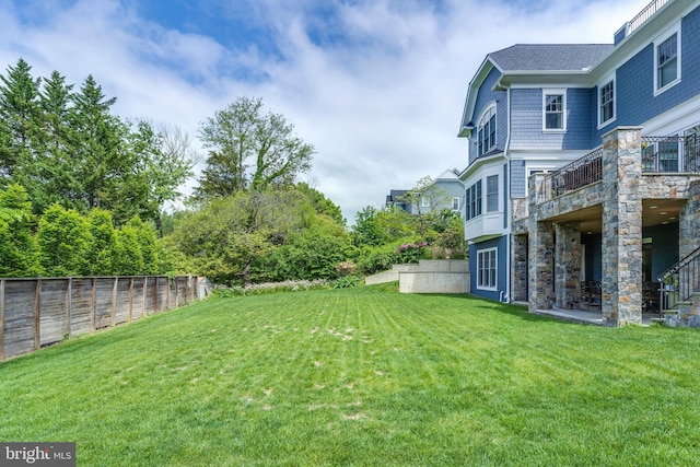 view of yard with fence