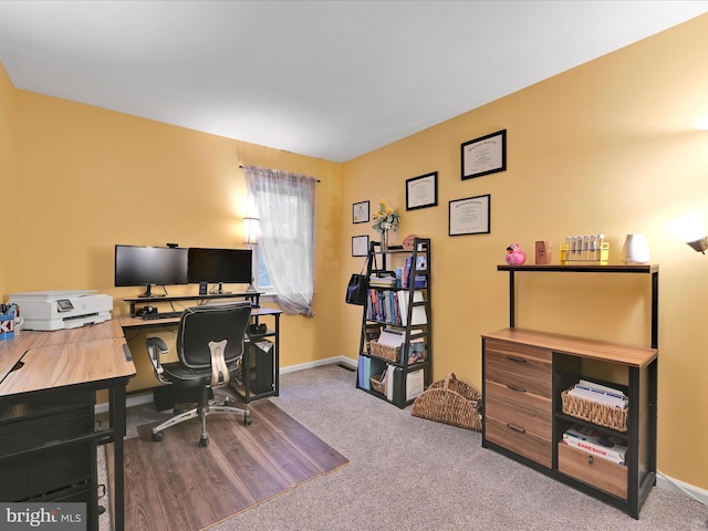 office area with carpet flooring and baseboards