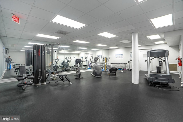 gym with a drop ceiling