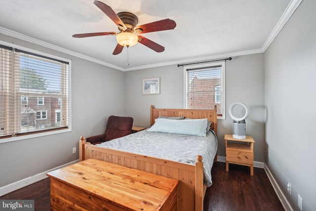 bedroom featuring ceiling fan, baseboards, dark wood finished floors, and crown molding