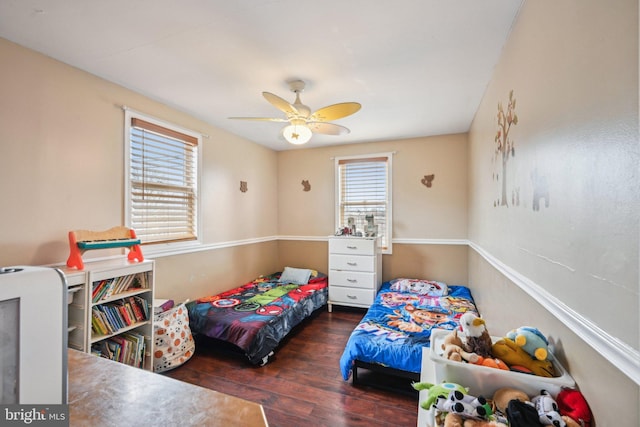 bedroom featuring ceiling fan and wood finished floors