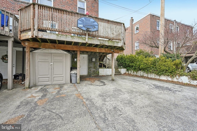 rear view of house with brick siding