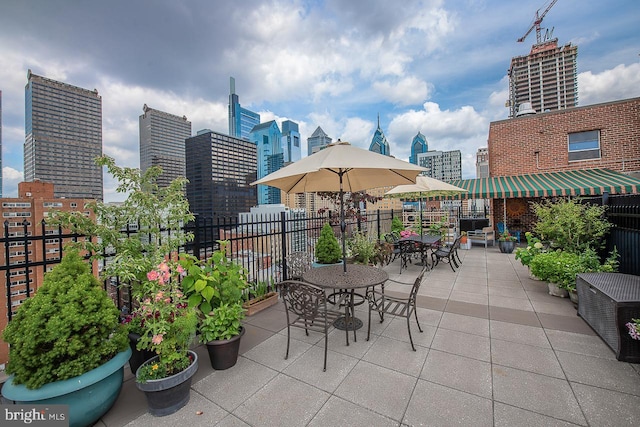 view of patio / terrace featuring a view of city