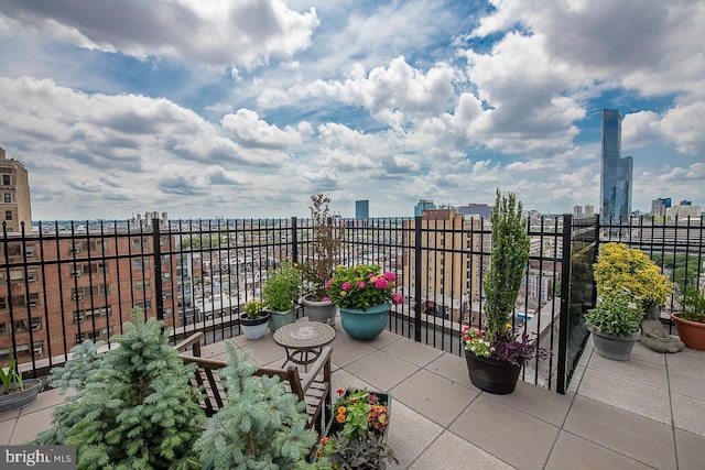 view of patio / terrace with a view of city