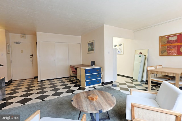 living area with light floors and baseboards