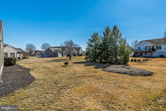 view of yard with a residential view