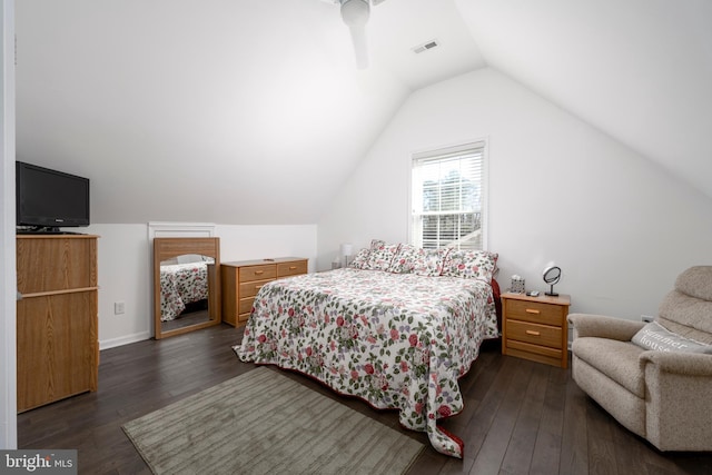 bedroom featuring visible vents, a ceiling fan, lofted ceiling, and dark wood-style flooring