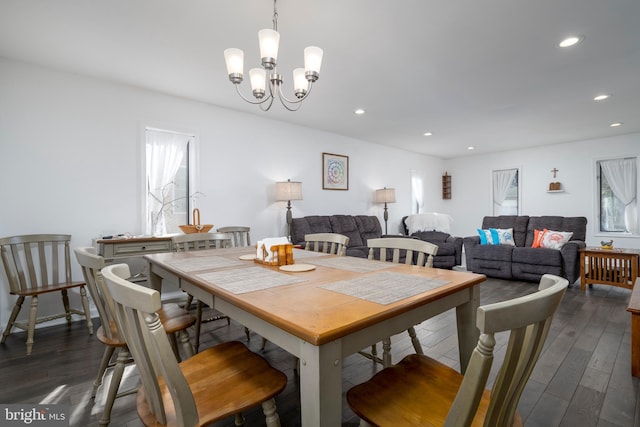 dining room with recessed lighting, a healthy amount of sunlight, and dark wood-style floors