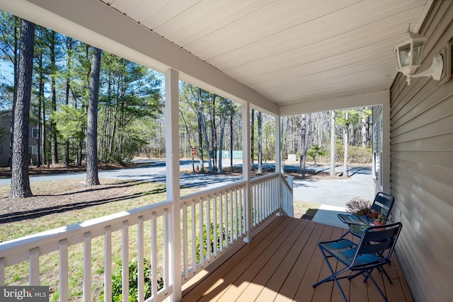 wooden terrace with covered porch