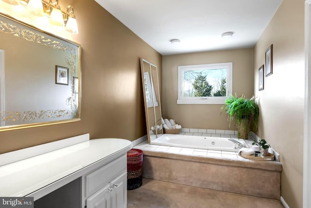 full bathroom featuring vanity and a bath