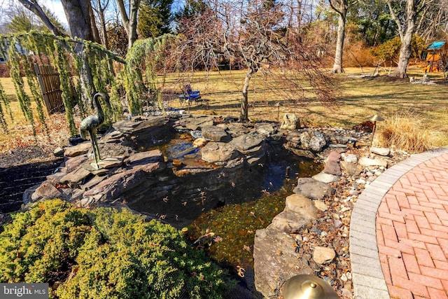 view of yard with fence