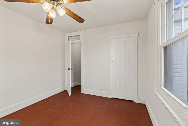 4513 E Stiles St, Philadelphia, PA 19124 - unfurnished bedroom with ceiling fan, baseboards, and dark wood-style flooring