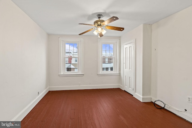 4513 E Stiles St, Philadelphia, PA 19124 - spare room featuring a ceiling fan, dark wood-style flooring, and baseboards