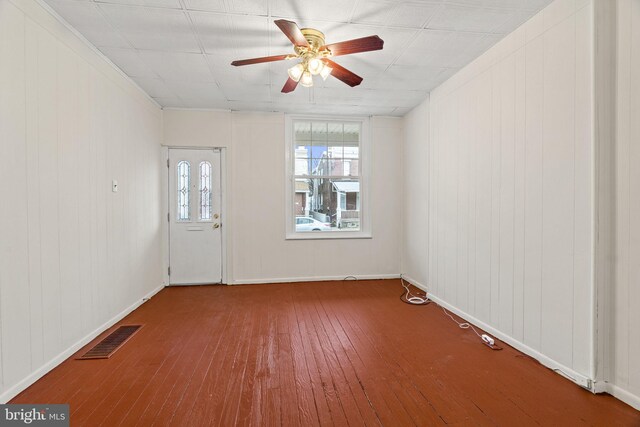 4513 E Stiles St, Philadelphia, PA 19124 - spare room featuring a ceiling fan, wood-type flooring, visible vents, and baseboards