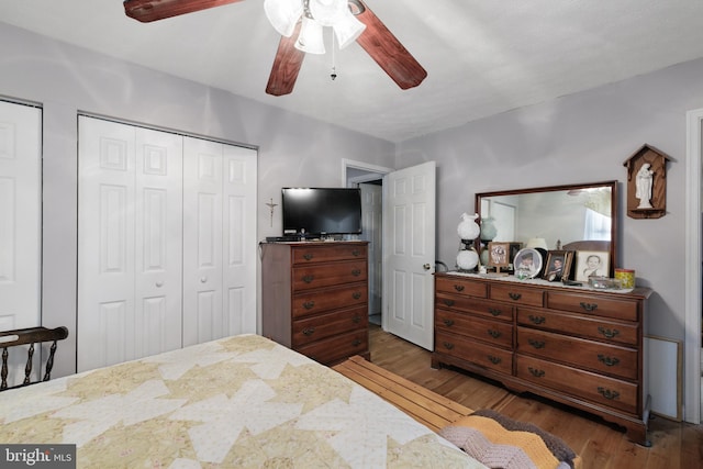 bedroom featuring ceiling fan and wood finished floors