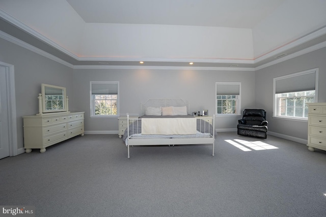 carpeted bedroom with a high ceiling, crown molding, and baseboards