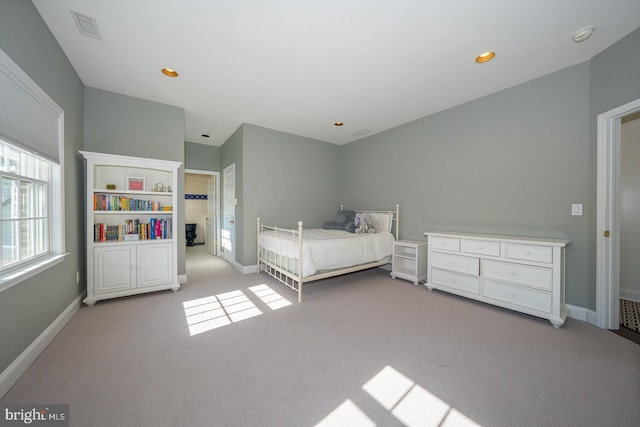 unfurnished bedroom featuring recessed lighting, carpet flooring, visible vents, and baseboards