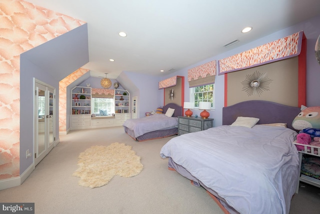 bedroom with recessed lighting, visible vents, vaulted ceiling, french doors, and carpet