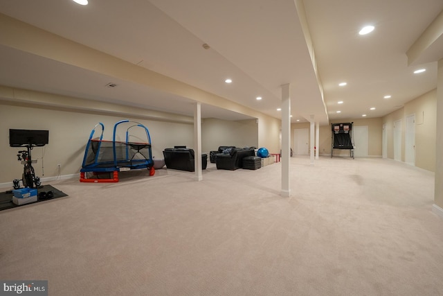 interior space featuring recessed lighting, baseboards, and carpet