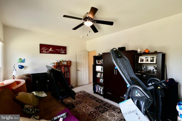 interior space featuring a ceiling fan