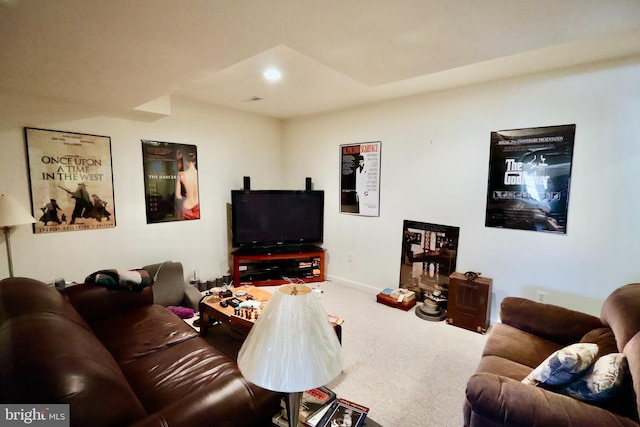 living room with carpet flooring, recessed lighting, and baseboards