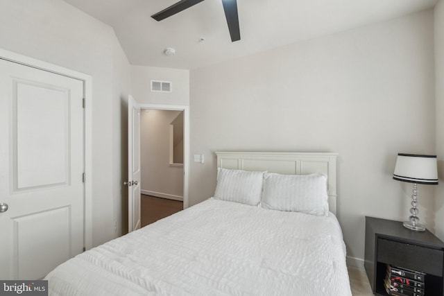 bedroom featuring visible vents and a ceiling fan