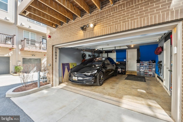 garage featuring driveway