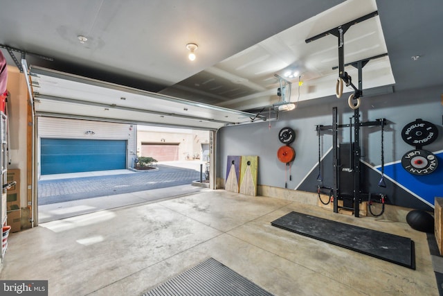 garage featuring a garage door opener