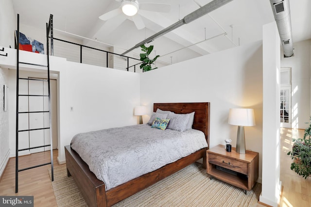 bedroom featuring wood finished floors