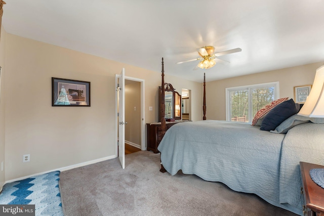 bedroom with carpet floors, ceiling fan, and baseboards