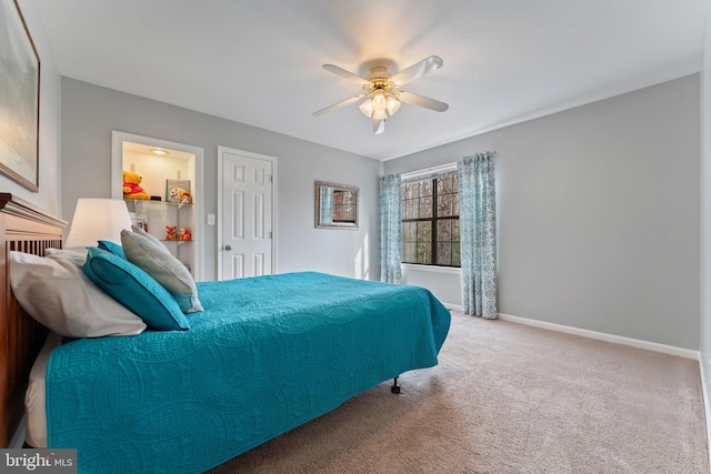 bedroom featuring carpet floors, ceiling fan, and baseboards