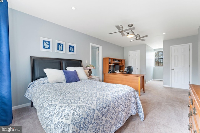 carpeted bedroom featuring recessed lighting, a ceiling fan, and baseboards