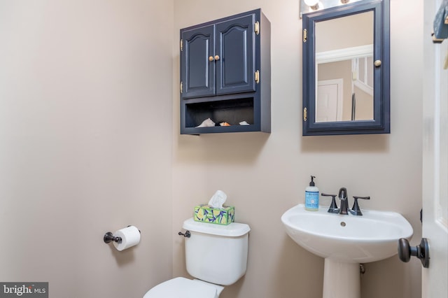 bathroom featuring toilet