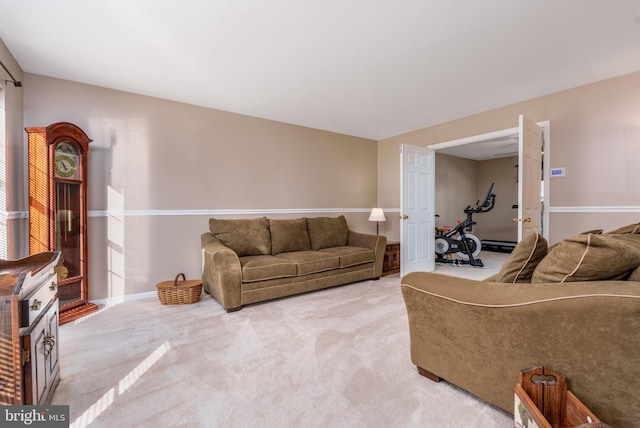 living area with light carpet