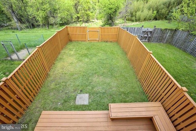 view of yard featuring a fenced backyard