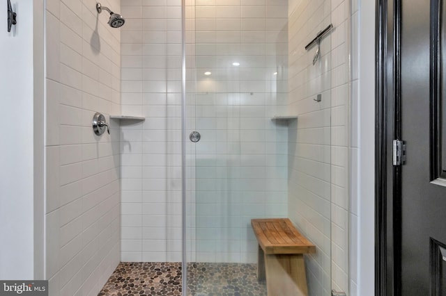 bathroom with a stall shower