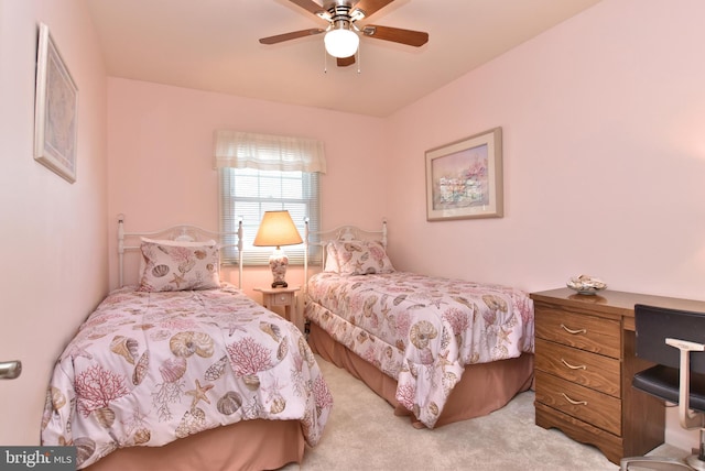 bedroom with ceiling fan and light colored carpet