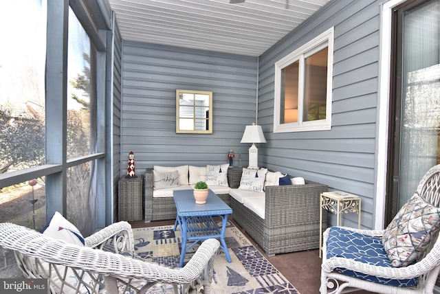 sunroom featuring a healthy amount of sunlight