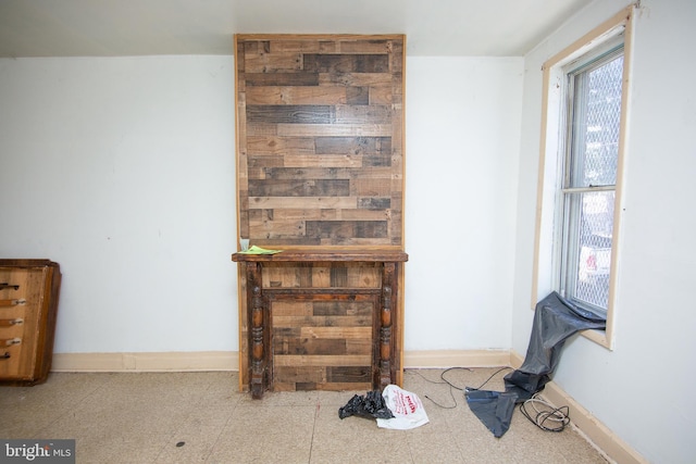 interior space featuring baseboards