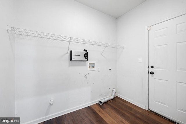 laundry room with dark wood-style flooring, hookup for a washing machine, gas dryer hookup, electric dryer hookup, and laundry area