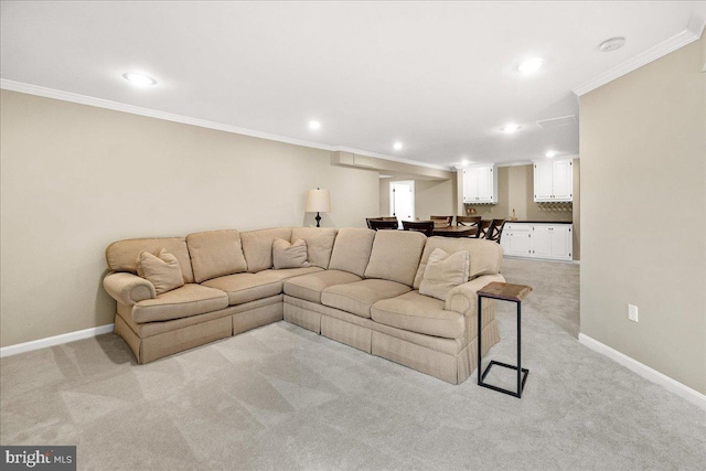 living area featuring baseboards, recessed lighting, light colored carpet, and crown molding