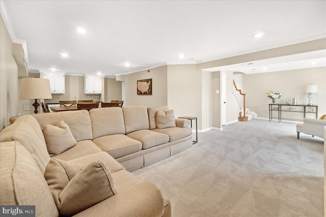 living area with light carpet, stairs, baseboards, and crown molding