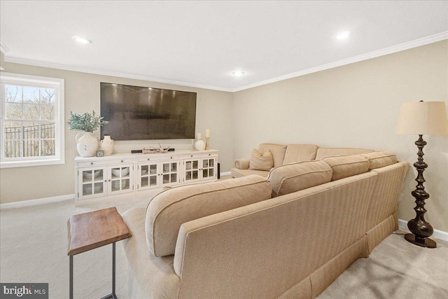 carpeted living room with ornamental molding, recessed lighting, and baseboards