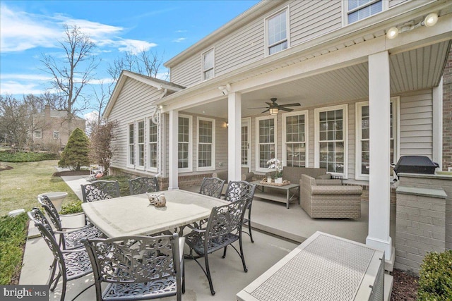 view of patio / terrace featuring ceiling fan, outdoor dining area, and outdoor lounge area