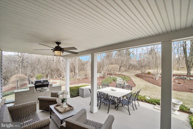 view of patio / terrace with ceiling fan, an outdoor kitchen, area for grilling, an outdoor living space, and outdoor dining space